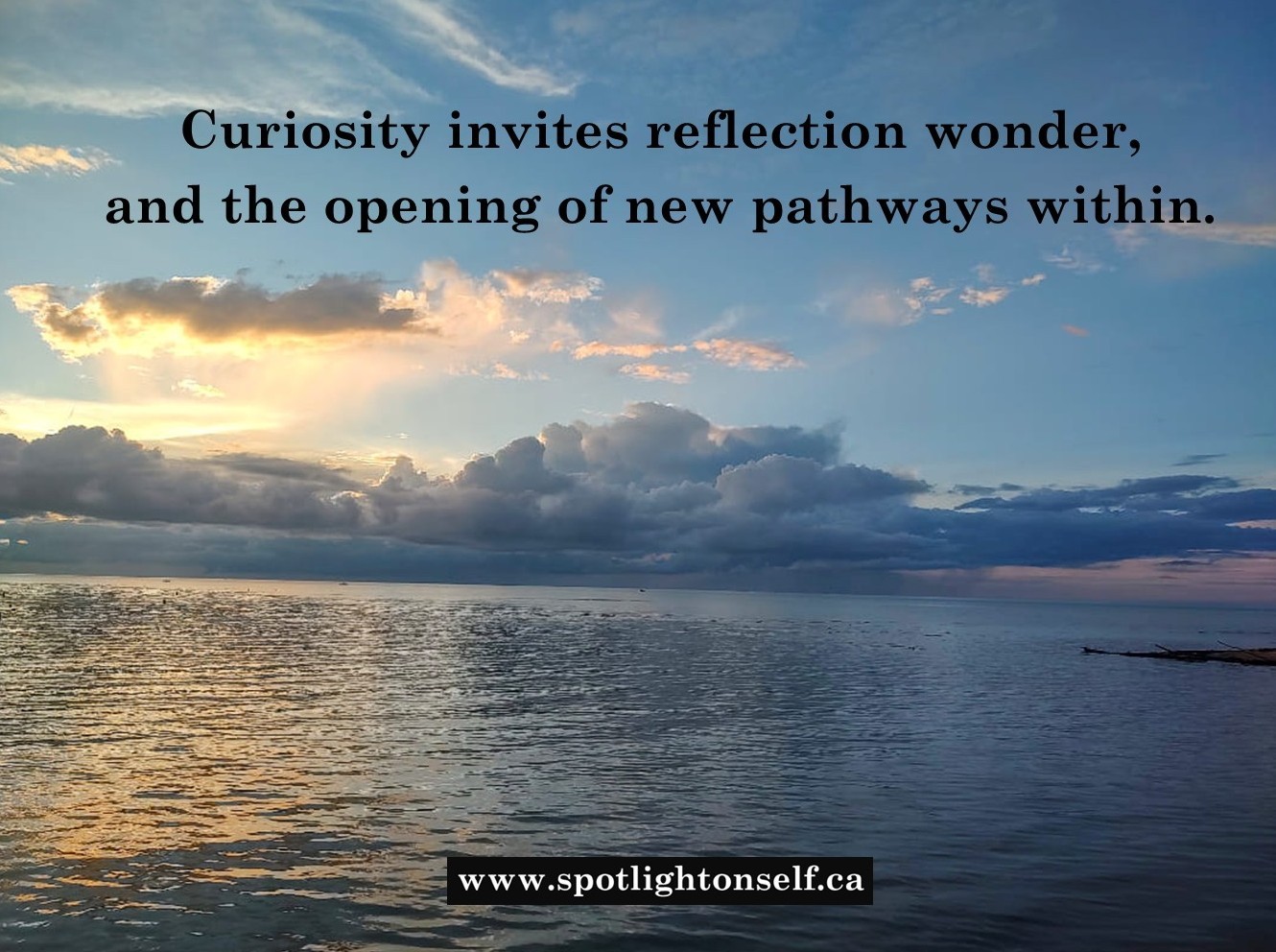 Sunset shining over a lake that is showing a reflection. Has a thought attached